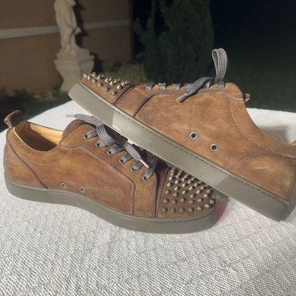 CHRISTIAN LOUBOUTIN
Louis Junior Spikes Leather Sneakers